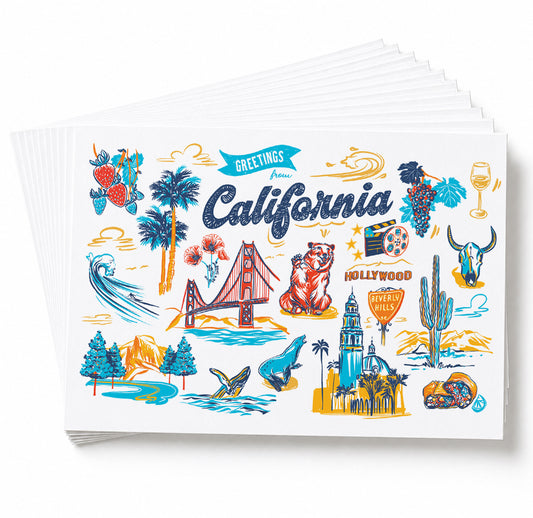 A stack of white greeting cards fanned out on a white background, featuring colorful California-themed illustrations including the Golden Gate Bridge, palm trees, a bear, a cowboy, cacti, and the words 'Greetings from California'.
