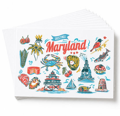A stack of greeting cards fanned out on a white background, with the top card reading 'Greetings from Maryland' and featuring colorful hand-drawn illustrations of local foods, landmarks, and symbols.