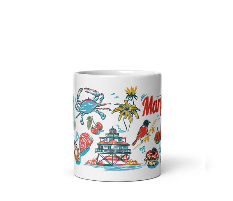 White mug with colorful coastal illustrations and the word 'Mary' on a white background