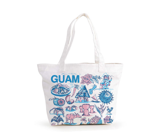 A white canvas tote bag featuring a colorful blue and pink illustration of Guam's landmarks, animals, and food, with the word 'GUAM' printed in blue on the front.